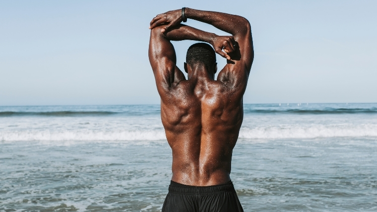 man with upper back muscles
